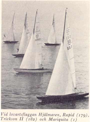 Several 30 metre boats starting a race